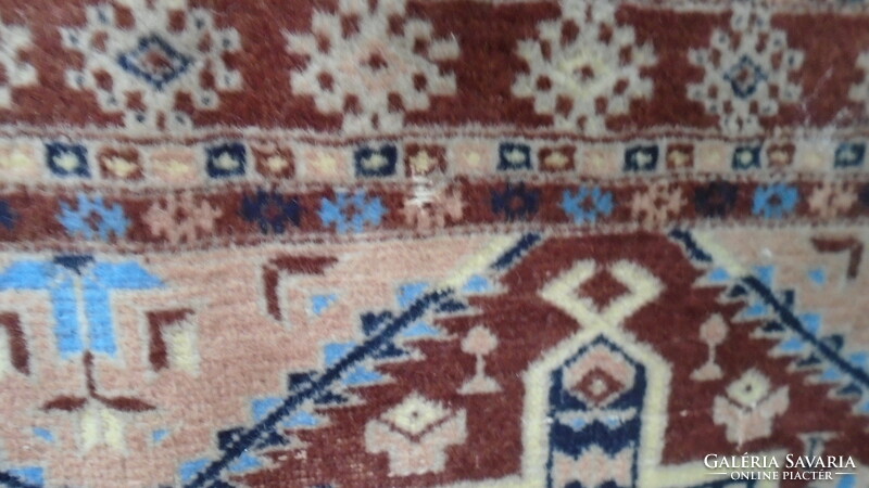 Antique hand-knotted oriental woolen Persian rug