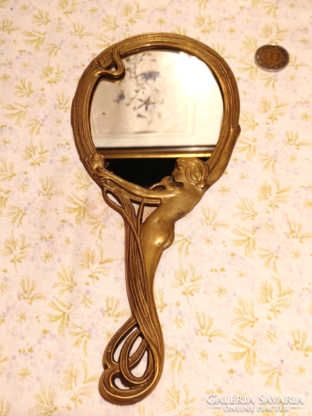 Art Nouveau copper mirror with a female figure
