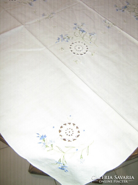 Beautiful machine-embroidered crochet tablecloth