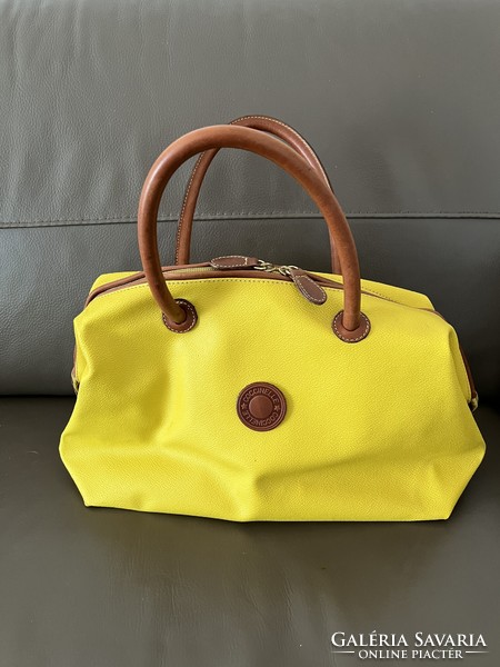 Beautiful yellow, premium quality coccinelle leather bag