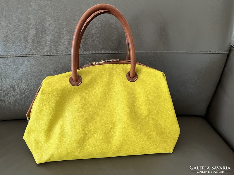 Beautiful yellow, premium quality coccinelle leather bag