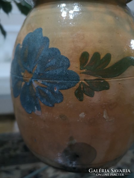 Glazed silk with blue flowers, old, damaged clay bowl