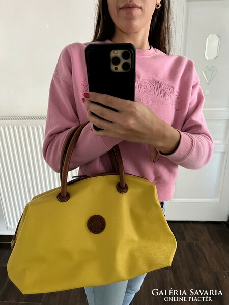 Beautiful yellow, premium quality coccinelle leather bag