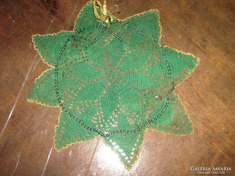 Charming hand-crocheted green Christmas star-shaped tablecloth