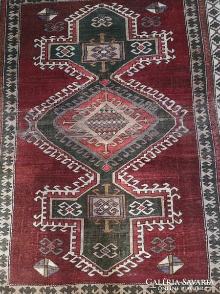 Hand-knotted old wool rug with Caucasian pattern. From an apartment!