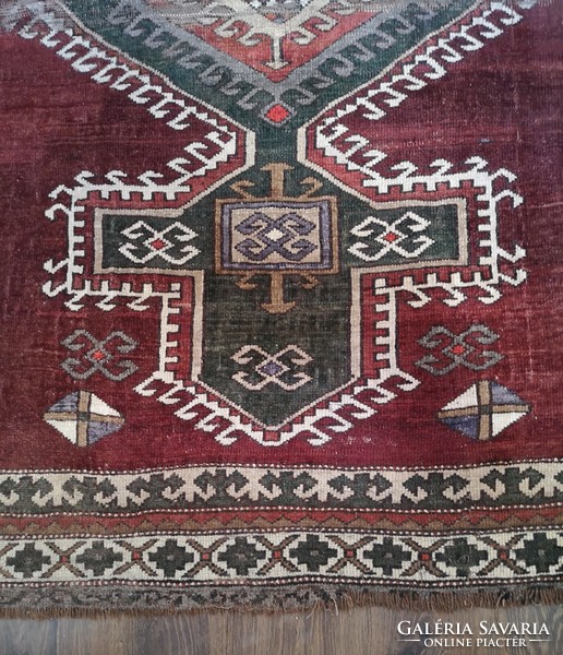 Hand-knotted old wool rug with Caucasian pattern. From an apartment!