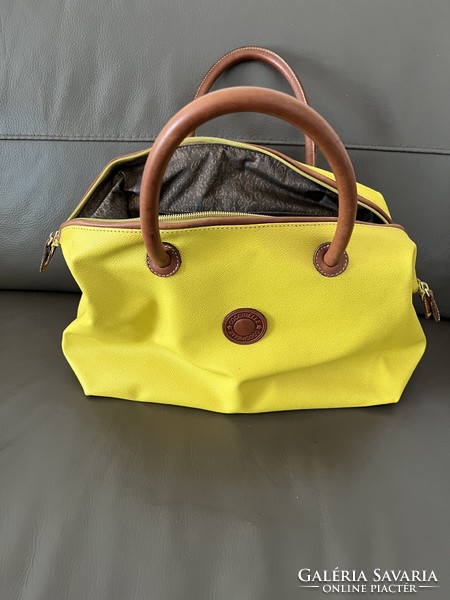 Beautiful yellow, premium quality coccinelle leather bag