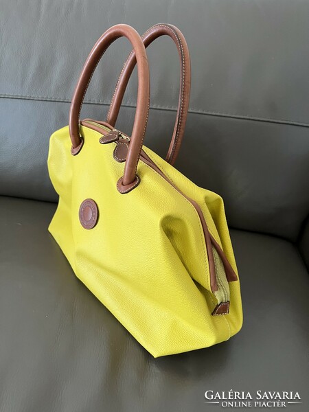 Beautiful yellow, premium quality coccinelle leather bag