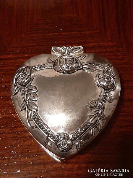 Heart-shaped silver-plated jewelry box with plush lining inside