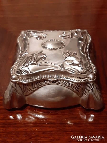 Specially shaped silver-plated jewelry box with plush lining inside