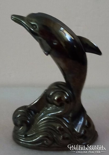 Old dolphin shaped lighter.