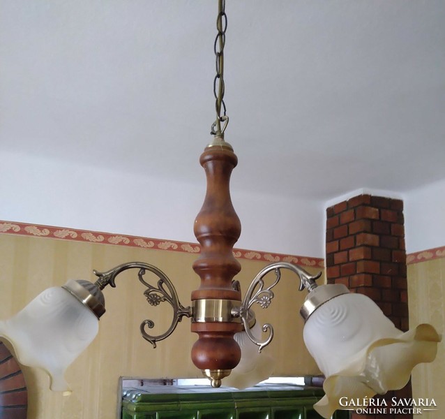 A very beautiful three-pronged chandelier in perfect condition