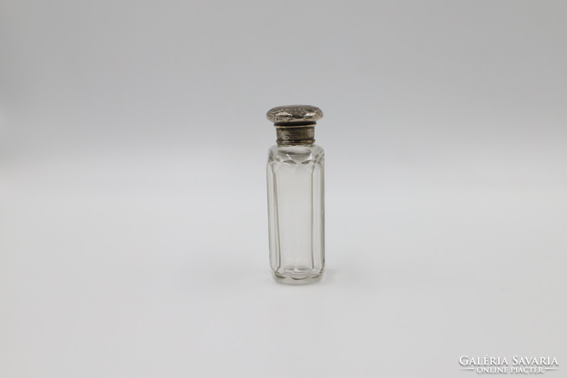 Perfume bottle with silver cap