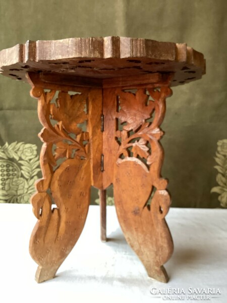 Hand-carved oriental table.