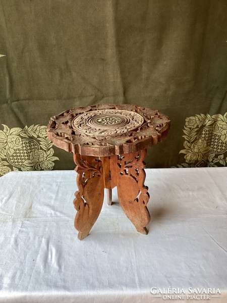 Hand-carved oriental table.