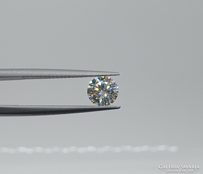 Extra 0.90 Carat brilliant cut moissanite. With certification.