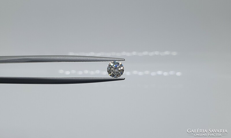 Extra 0.43 Carat brilliant-cut moissanite. With certification.
