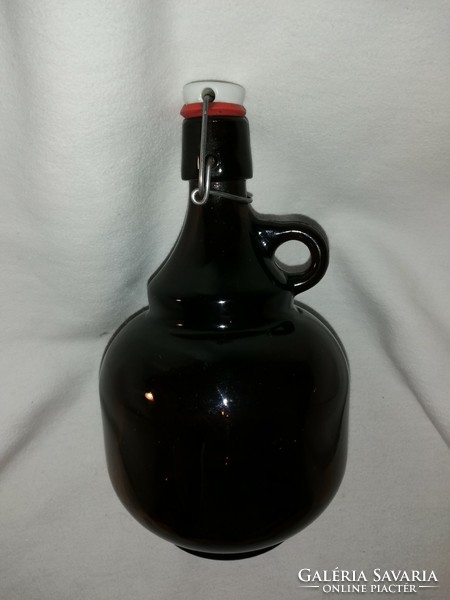 2 liter bottle with marked brown handle