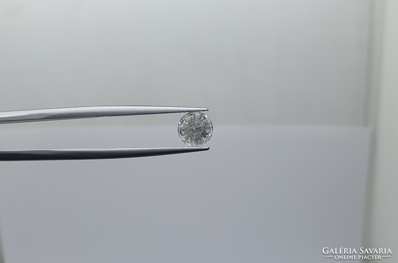 0.90 carat brill cut moissanite. With certification.