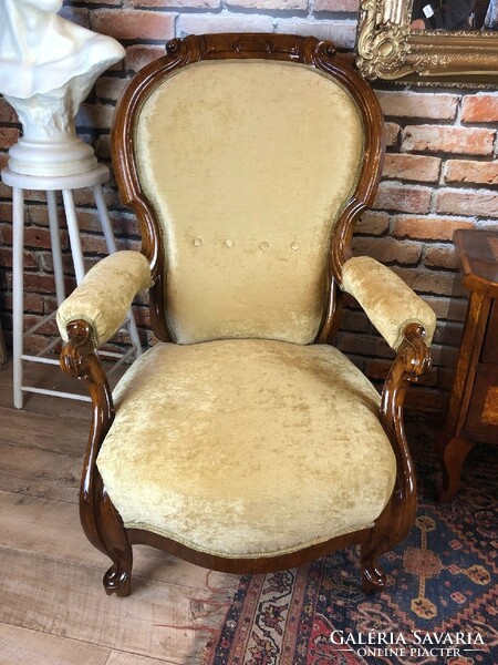A pair of neo-baroque restored armchairs.
