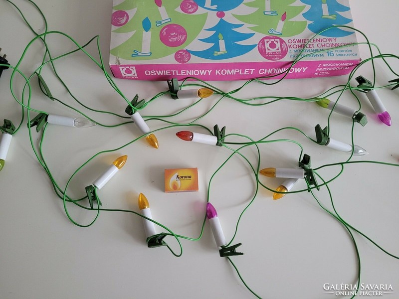 Old Christmas string of retro light bulbs with clip-on candles Christmas tree in a box