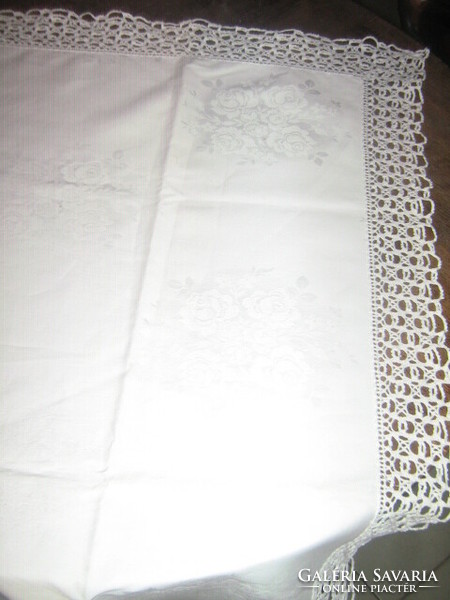 Beautiful vintage rosy silk tablecloth with lacy edges
