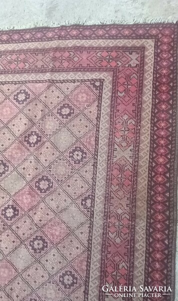 Hand-knotted antique Kazakh carpet is negotiable