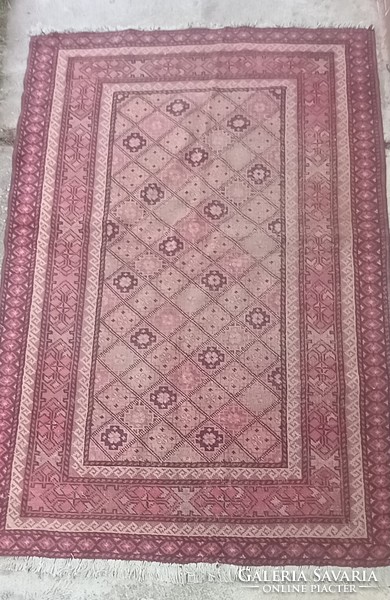 Hand-knotted antique Kazakh carpet is negotiable