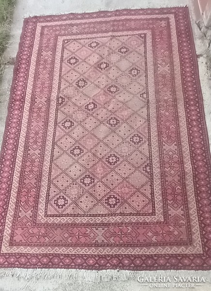 Hand-knotted antique Kazakh carpet is negotiable