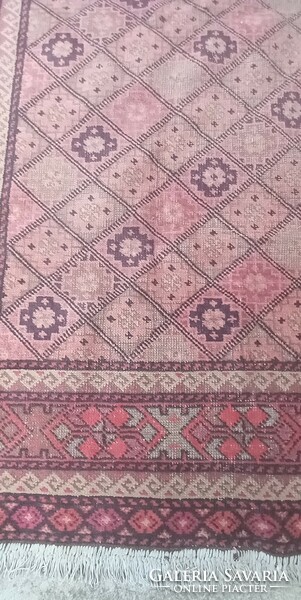 Hand-knotted antique Kazakh carpet is negotiable