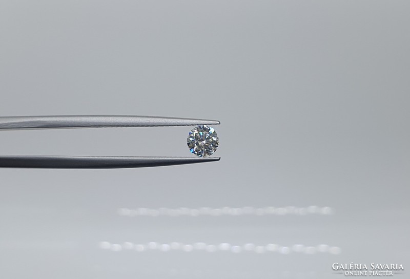 Extra 0.43 Carat brilliant-cut moissanite. With certification.