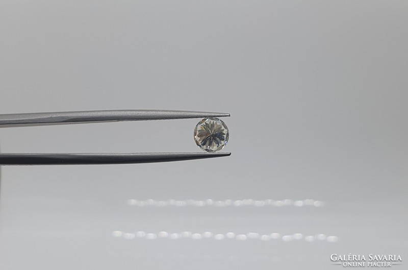 Extra 0.90 Carat brilliant cut moissanite. With certification.