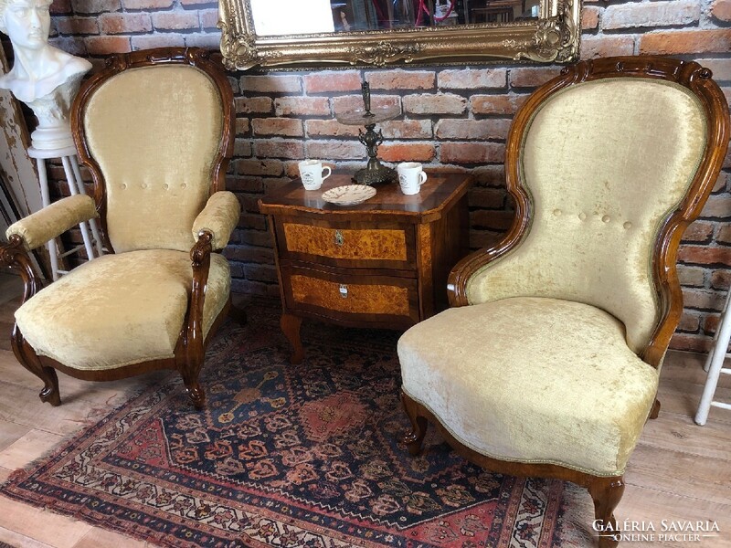 A pair of neo-baroque restored armchairs.