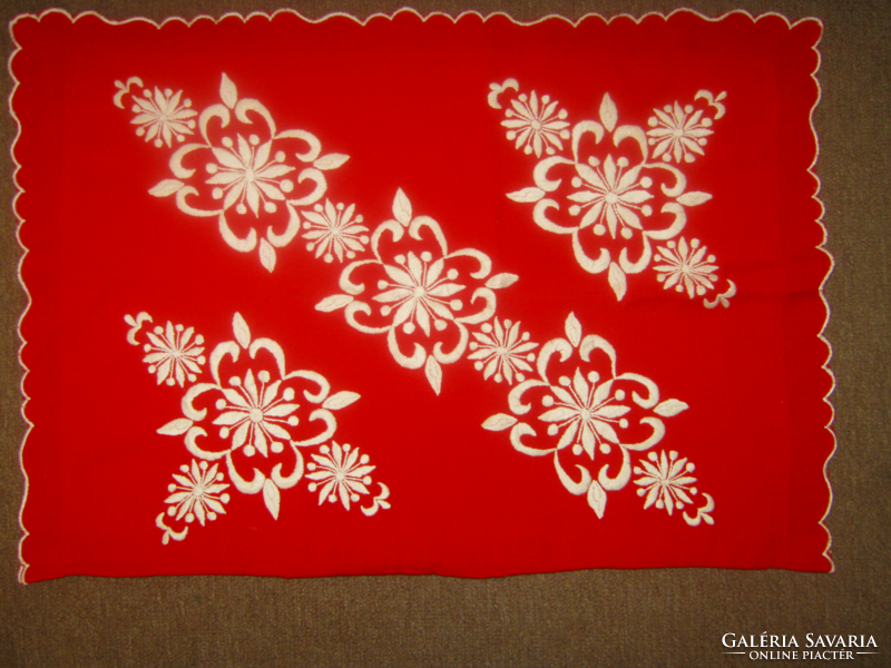 Embroidered cushion red