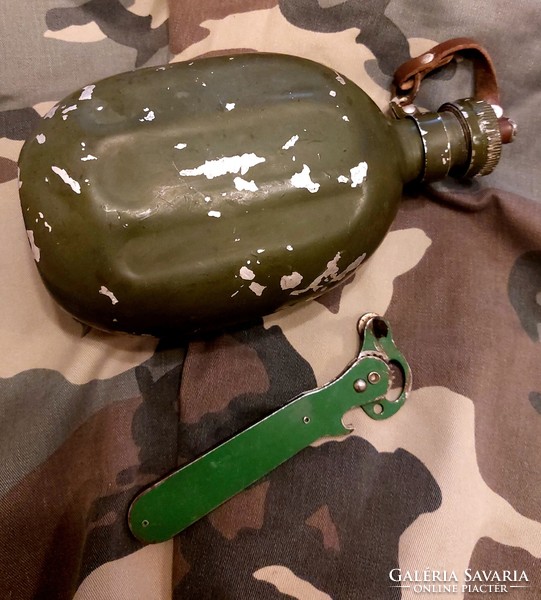 Military water bottle and can opener for sale together.