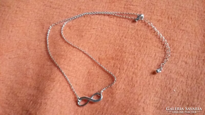 Old unused avon necklace with a mark on the ends