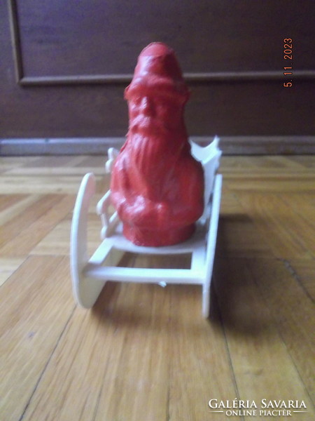Old, retro Santa Claus with sleigh - plastic gift box