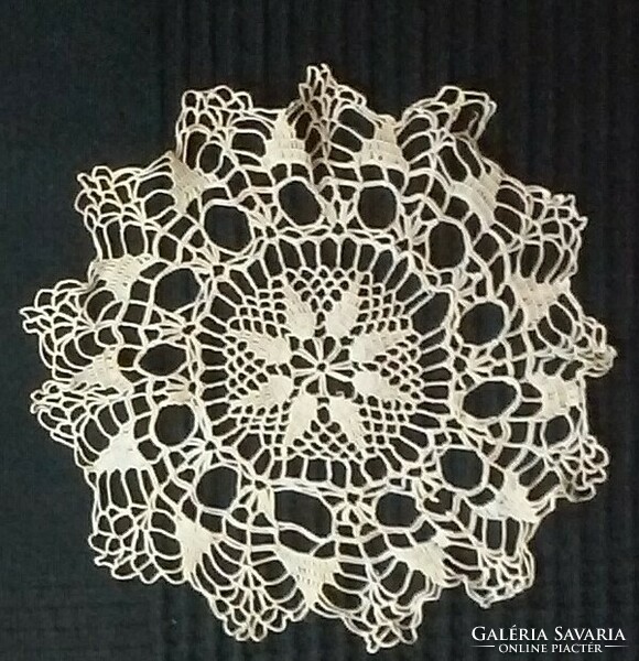 Five small crochet lace tablecloths in one