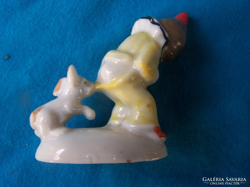 A little boy with a dog is a product of the Wagner & Apel porcelain factory