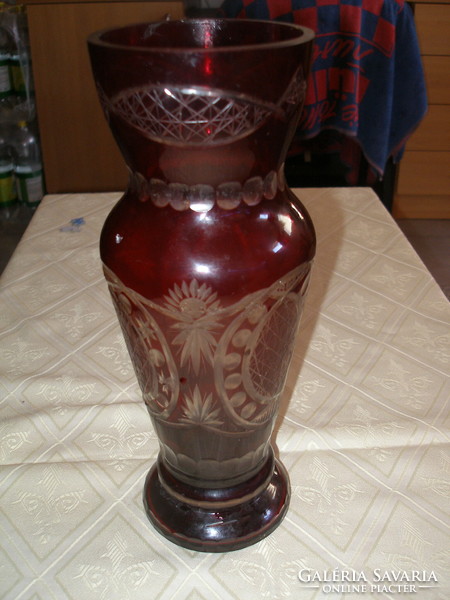 Old, polished, colored glass vase