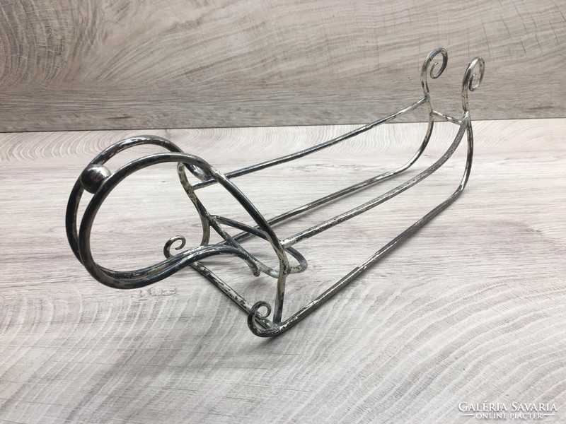 Old art deco sled-shaped glass holder