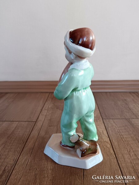 A rare Zsolnay figure in green clothes