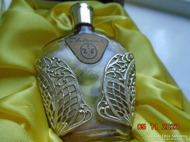 Chance parfum bottle in a decorative silver-plated lattice socket, in an original art deco silk-lined box