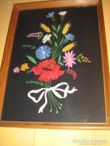 A beautiful folk tradition preserver in a Kalocsa embroidered handwork frame