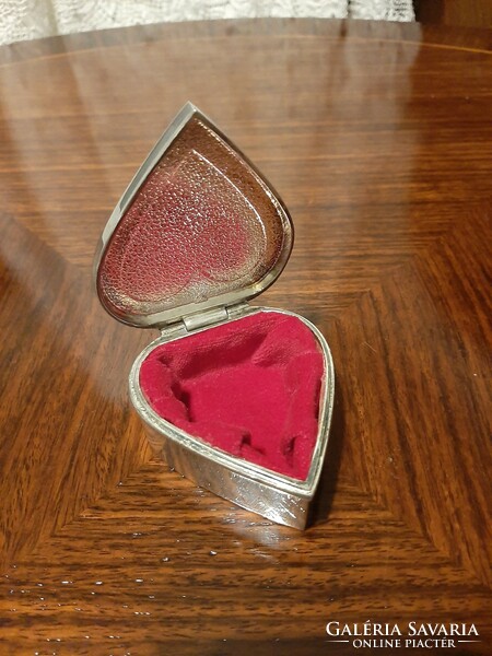 Heart-shaped silver-plated jewelry box with plush lining inside