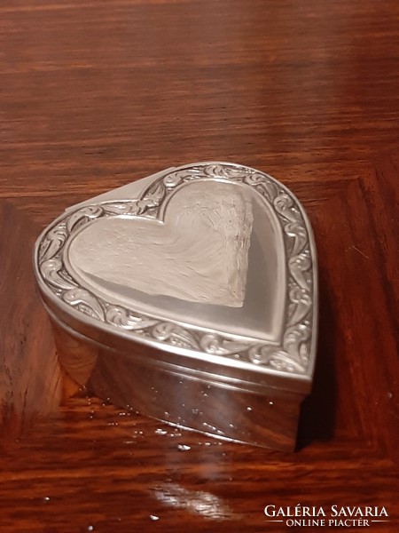Heart-shaped silver-plated jewelry box with plush lining inside