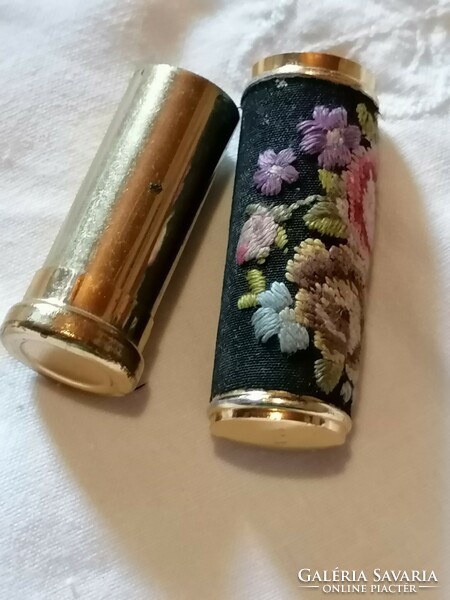 An embroidered lipstick holder from a bygone era