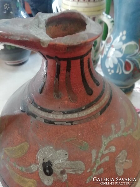 Antique folk jug 1 is in the condition shown in the pictures