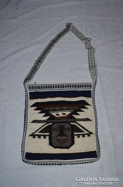 Woven wool satchel with figural decoration