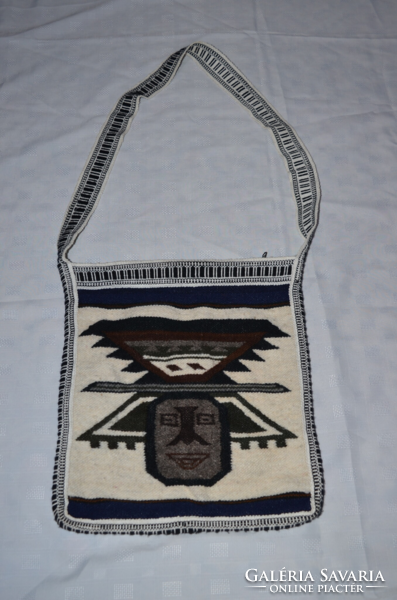 Woven wool satchel with figural decoration